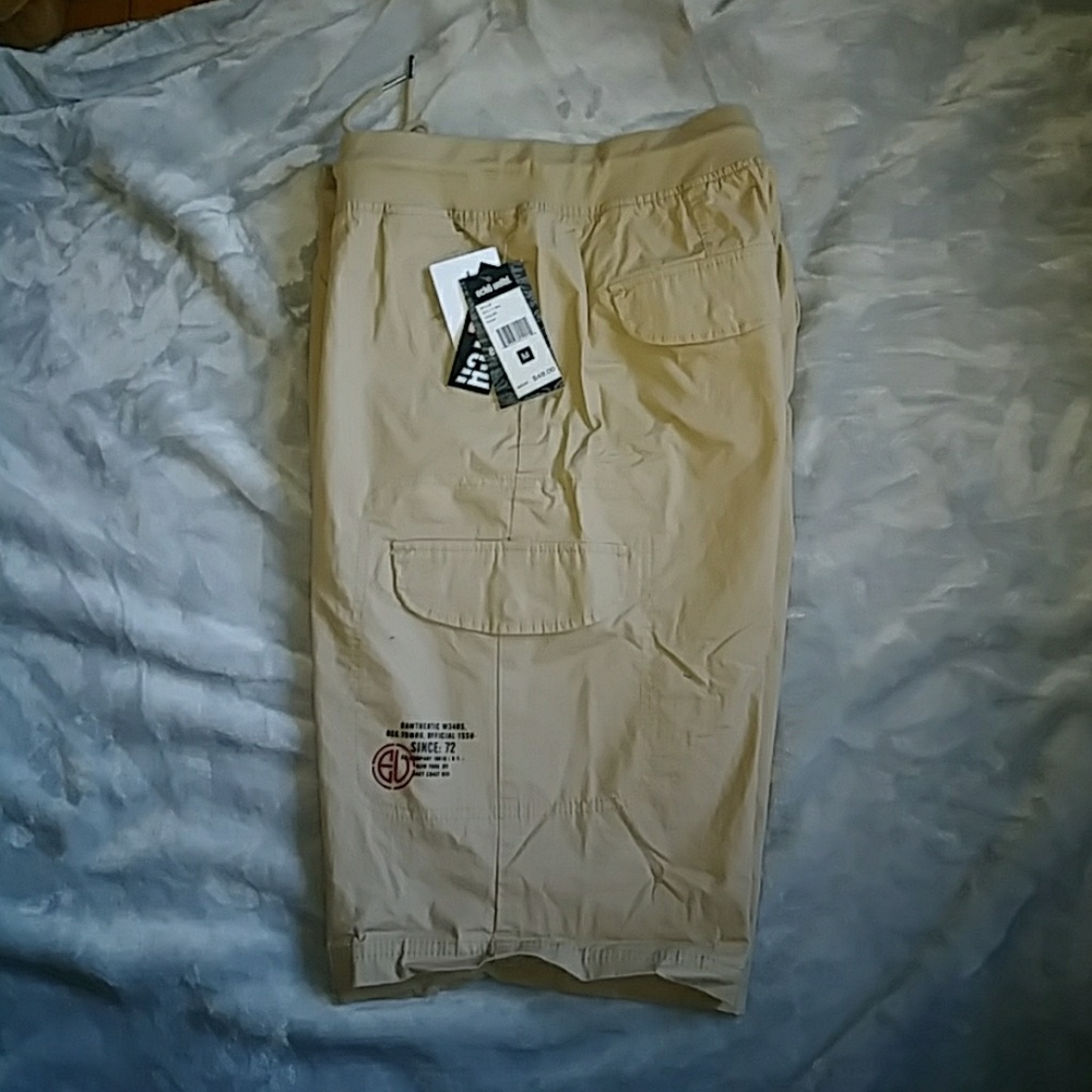 Brand new witg tags. Mens khaki shorts. Medium